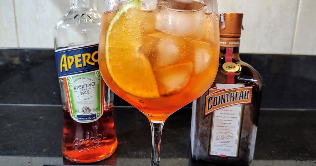 Como Fazer Aperol Spritz Royale: O Coquetel Refrescante e Elegante com Toque de Cointreau!